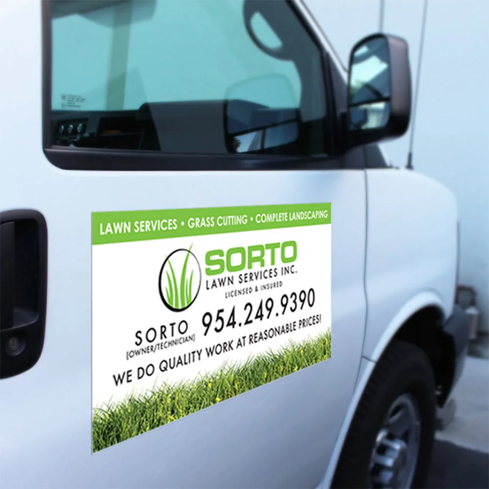 Printed magnetic panel applied to the door of a white work van